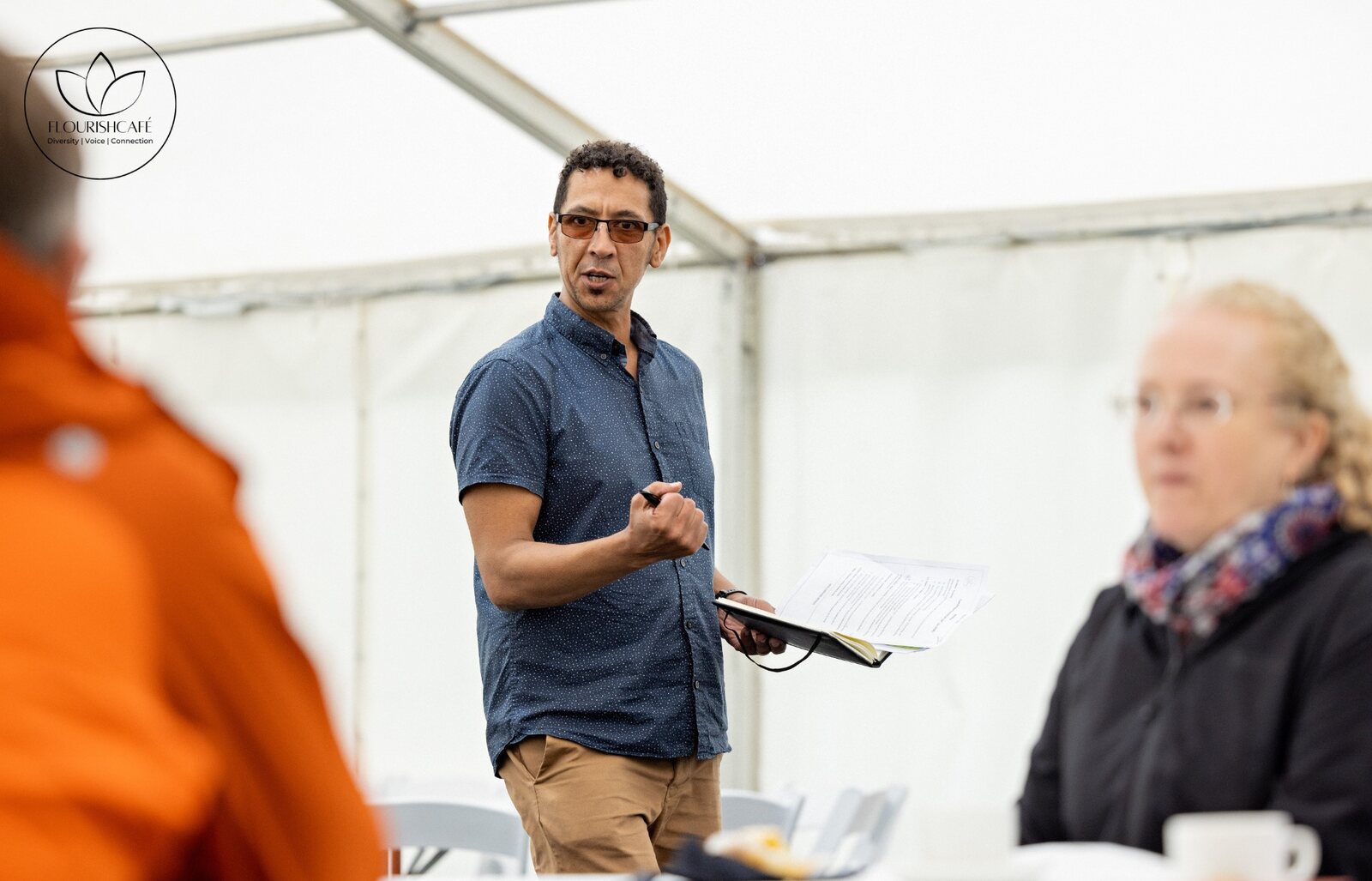 A presenter leading a discussion during a project workshop